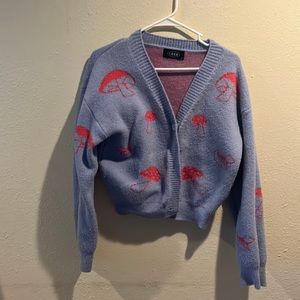 Blue cardigan button red mushrooms soft